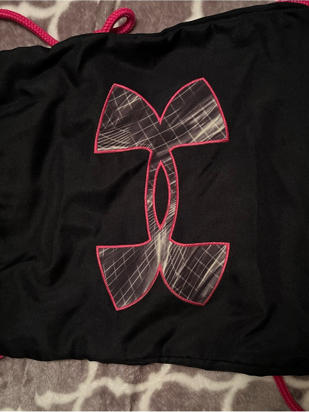 Under Armour Black drawstring bag with pink trim
